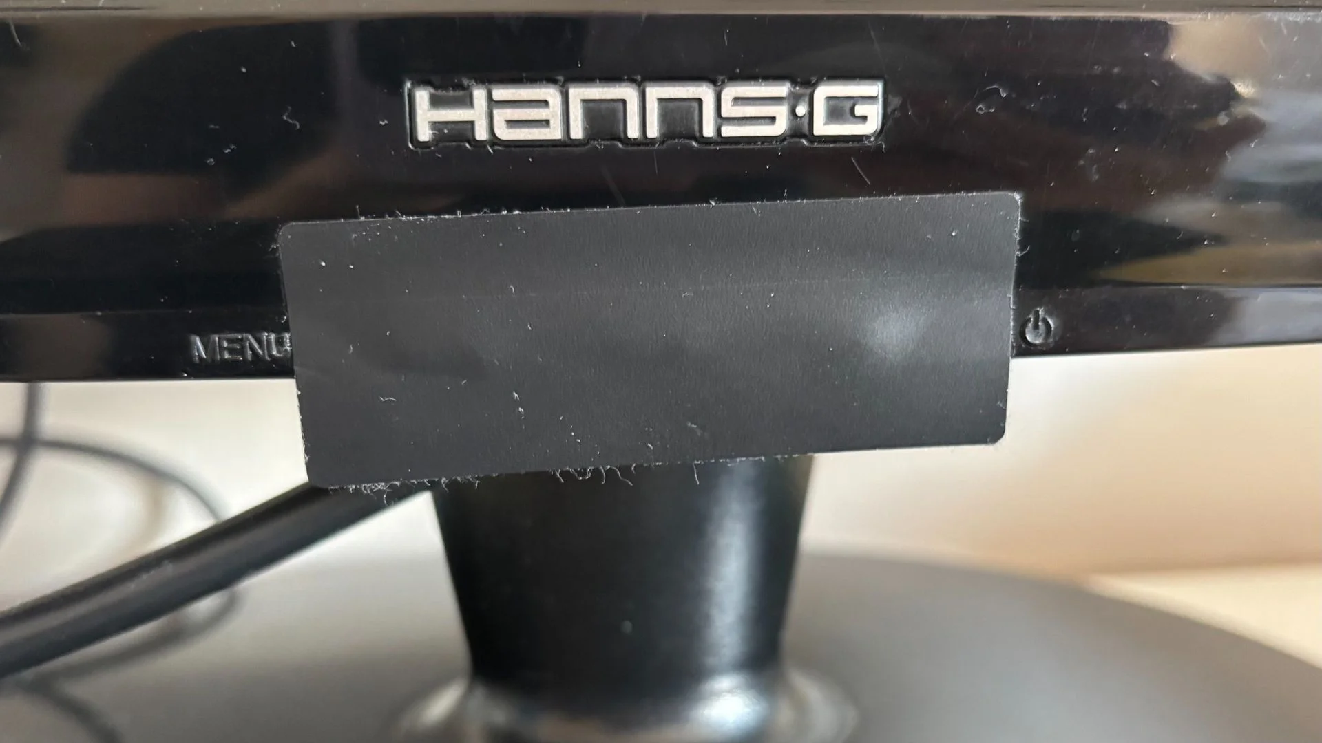 Light-blocking sticker on computer monitor's standby light.