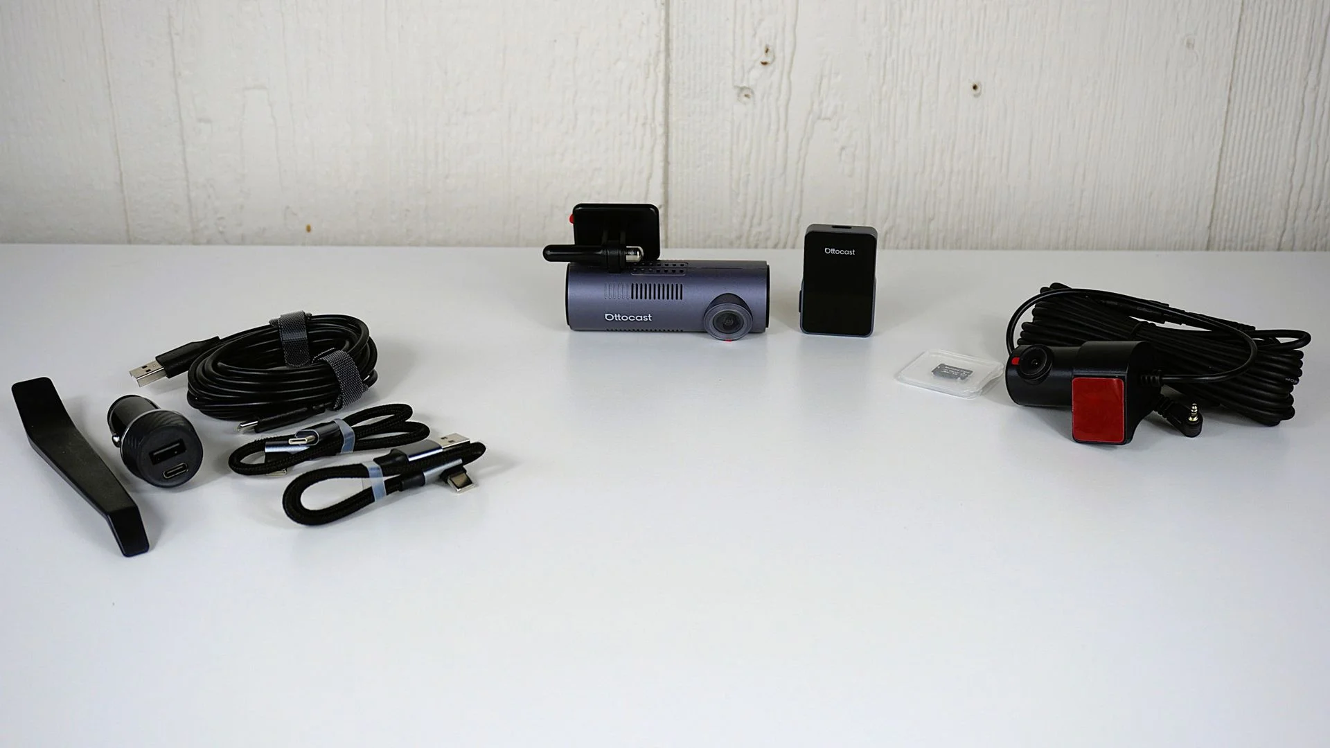The Ottocast OttoSafe Cam dash cam unboxed on a table