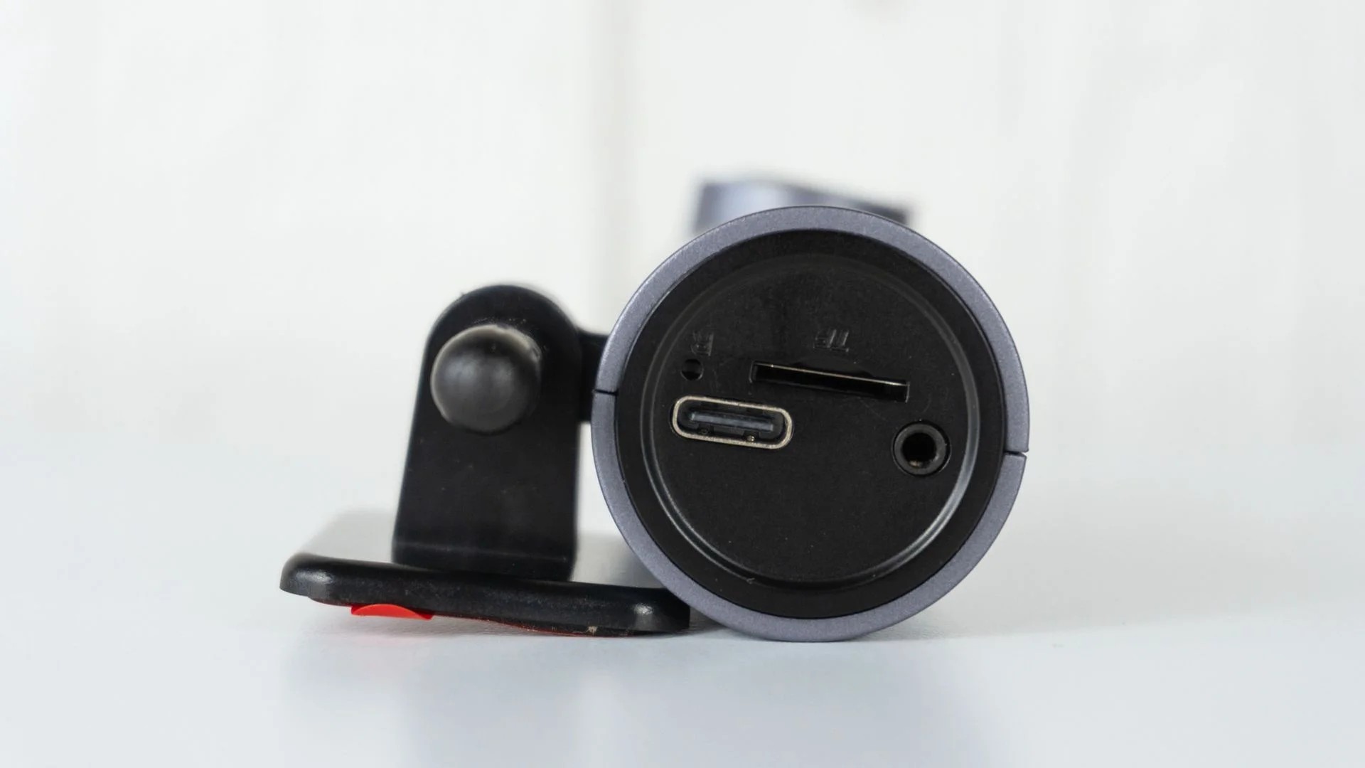 A side view of the Ottocast OttoSafe Cam's ports and microSD card slot